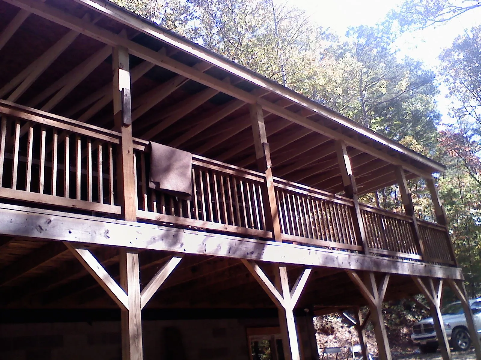Timber framing under a new elevated porch and deck — Roof Leak Repair in Elkland by Roofing Brothers